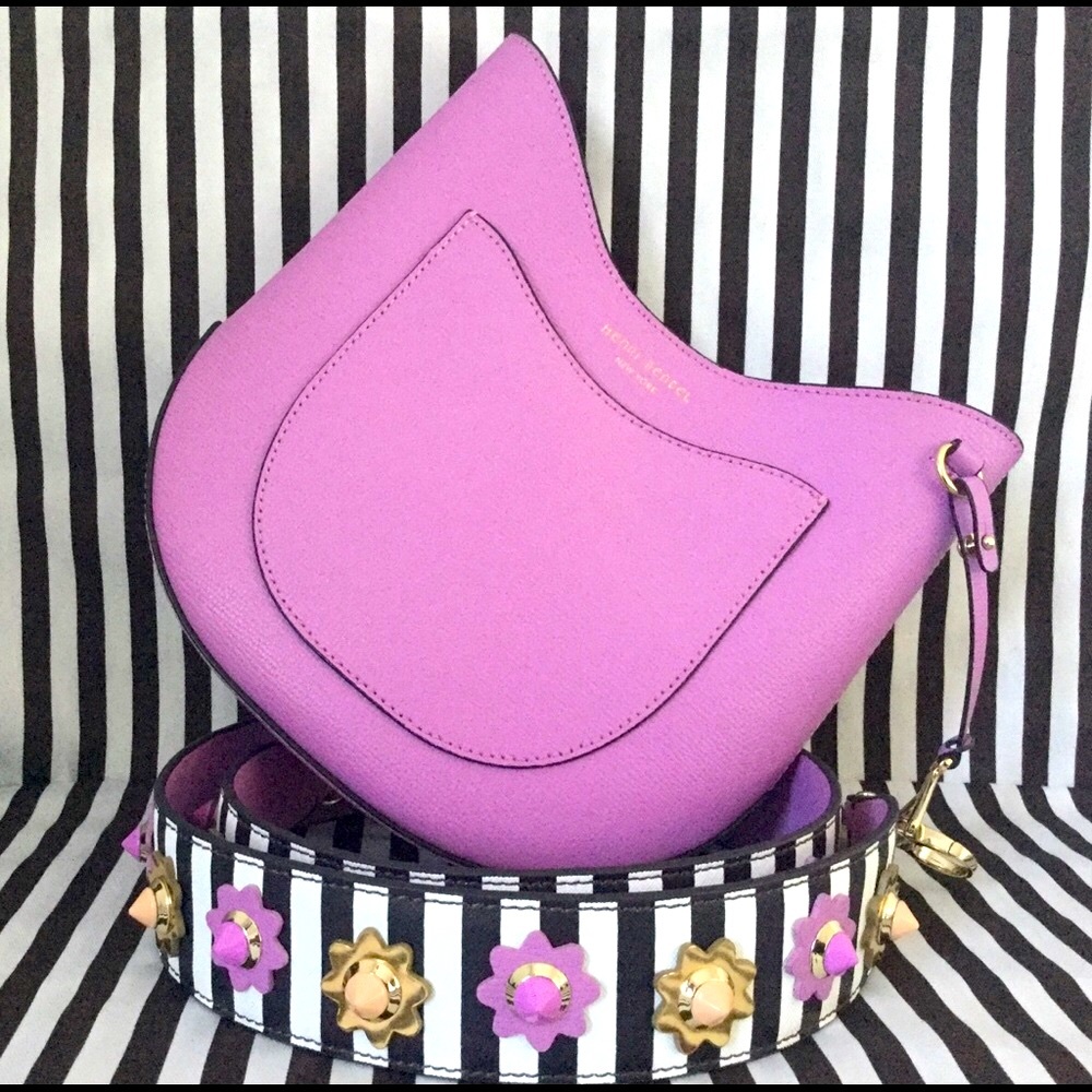 Henri Bendel hobo with centennial guitar strap